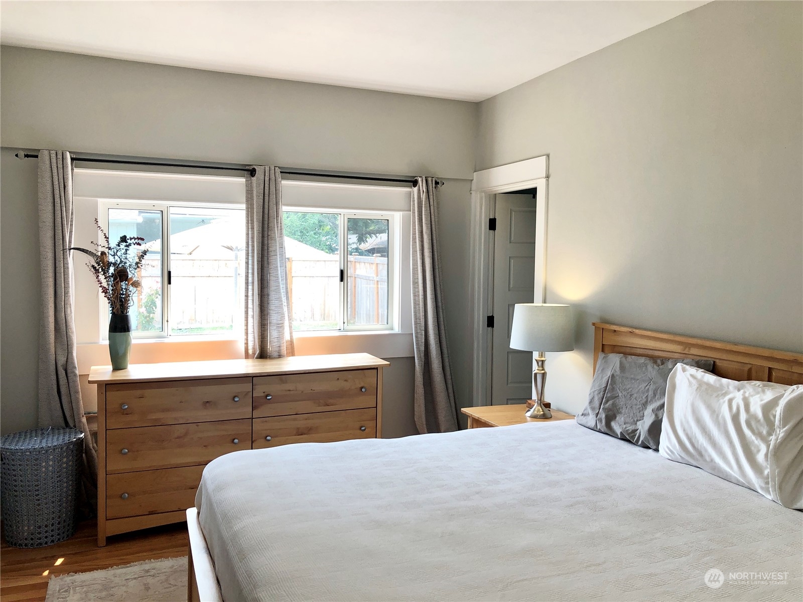 375 Southeast Bush Street Issaquah, WA 98027 - Photo 26 of 40 a bedroom with a large bed and a window