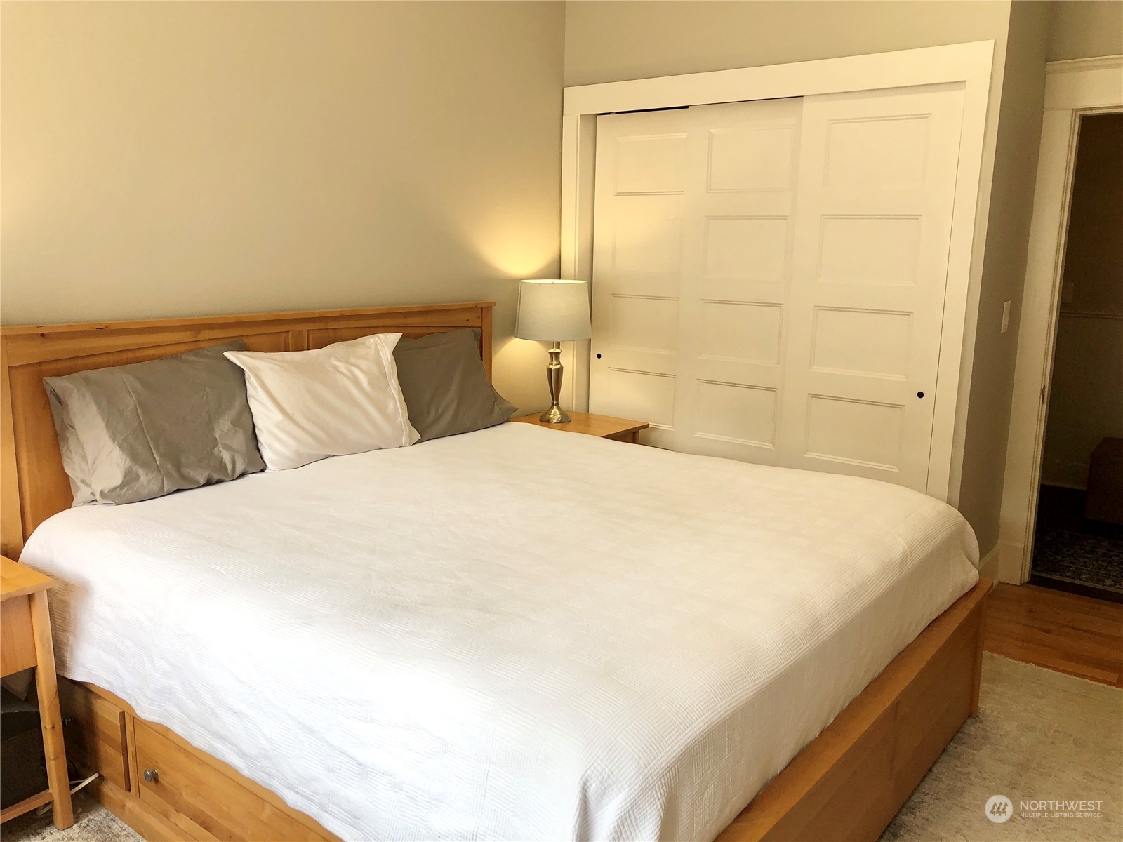375 Southeast Bush Street Issaquah, WA 98027 - Photo 28 of 40 a large bed sitting in a bedroom next to a window
