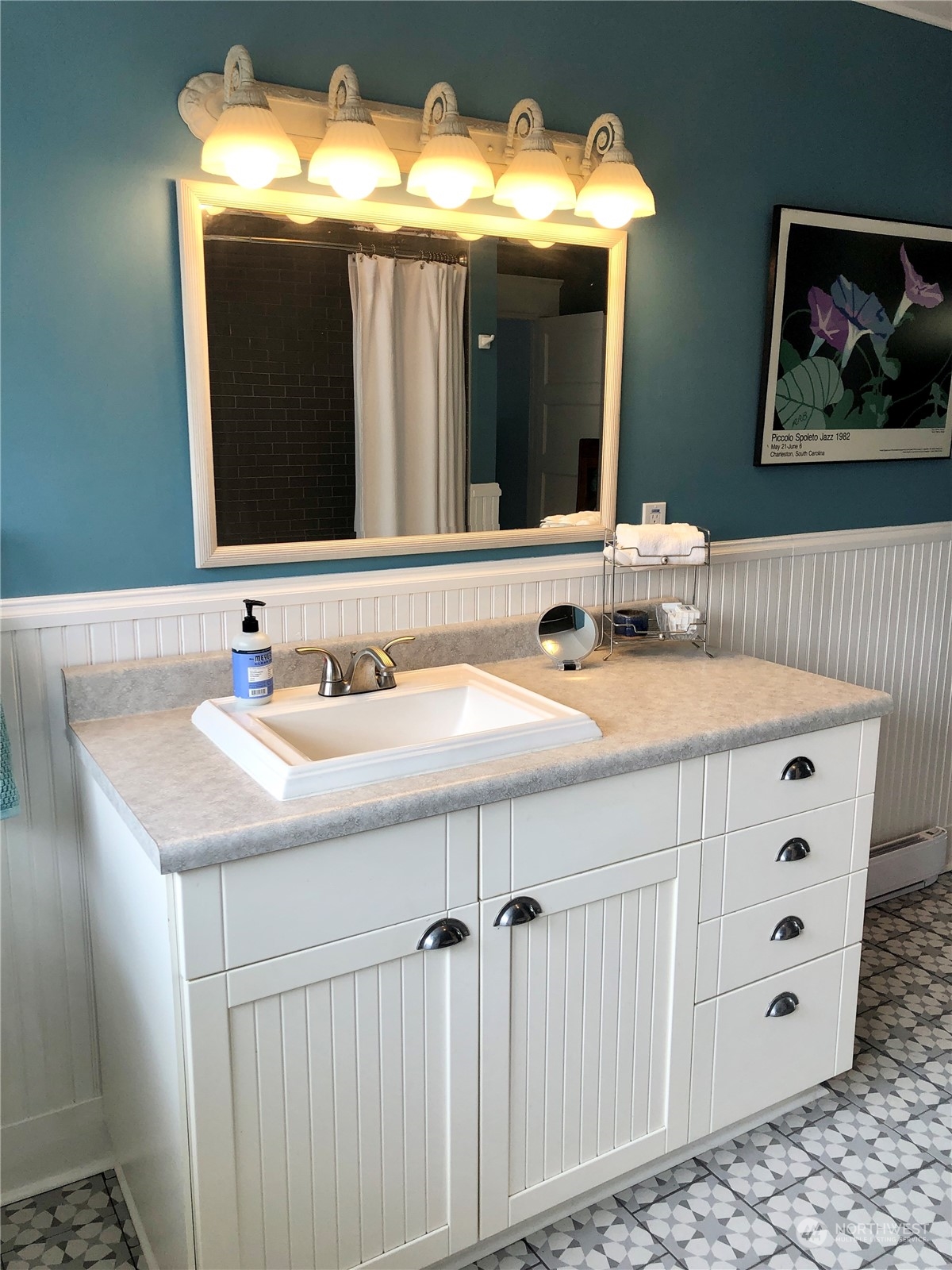 375 Southeast Bush Street Issaquah, WA 98027 - Photo 30 of 40 a bathroom with a sink and a mirror