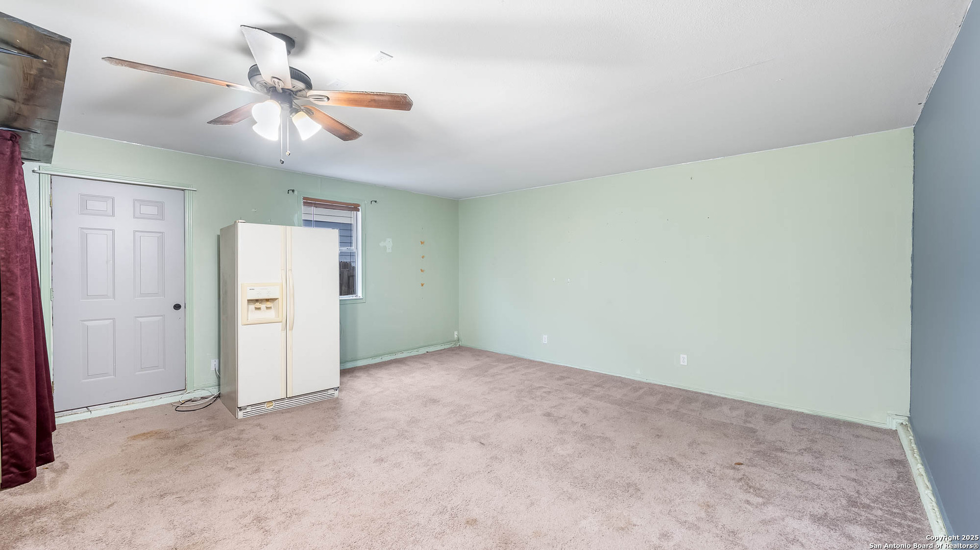 9406 San Fidel Rio San Antonio, TX 78245 - Photo 11 of 23 an empty room with a chandelier fan and closet