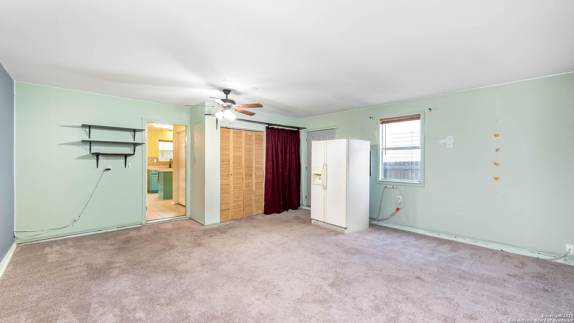9406 San Fidel Rio San Antonio, TX 78245 - Photo 13 of 21 an empty room with closet and a hallway