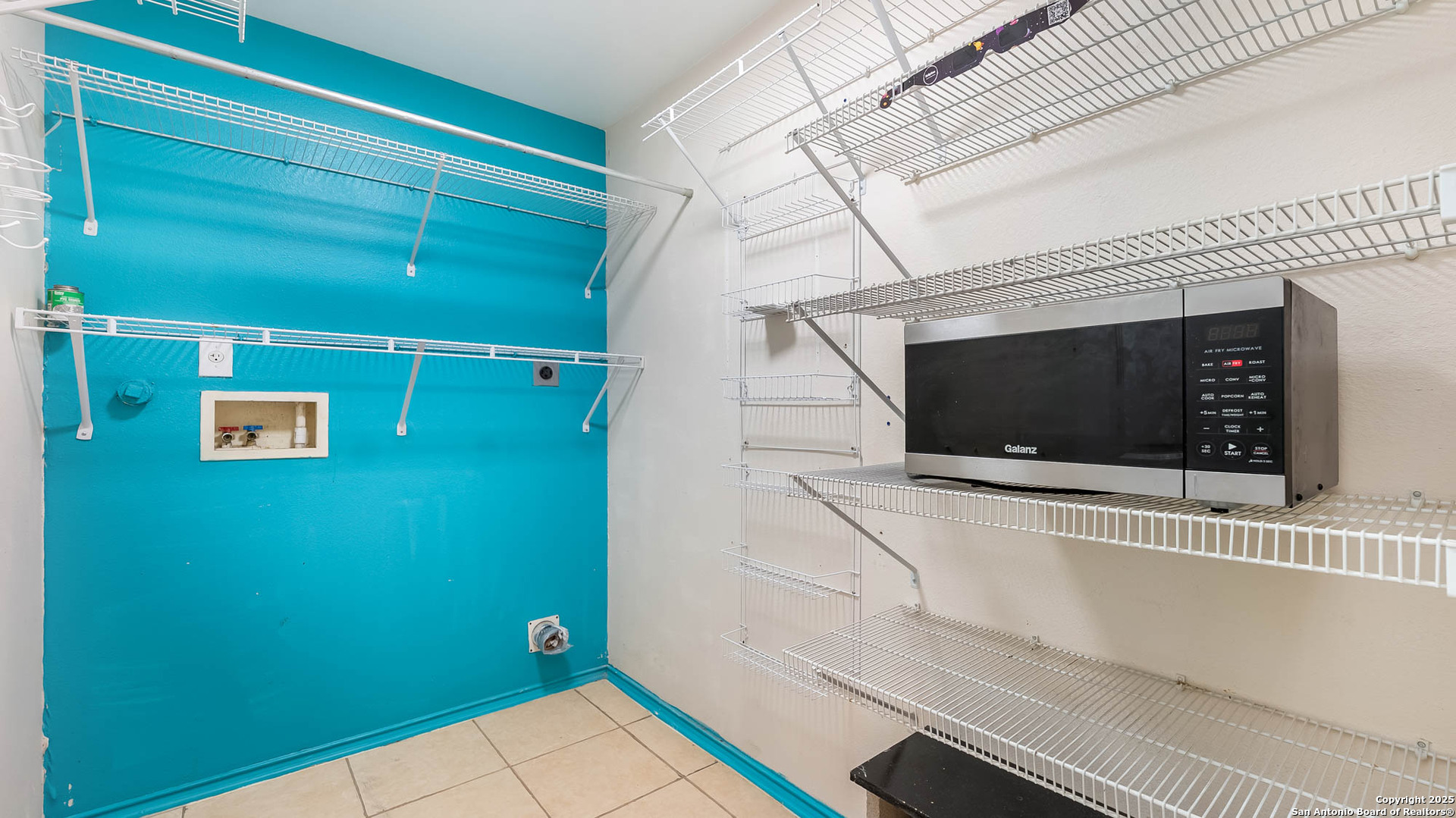 9406 San Fidel Rio San Antonio, TX 78245 - Photo 19 of 23 a view of a door and wooden floor
