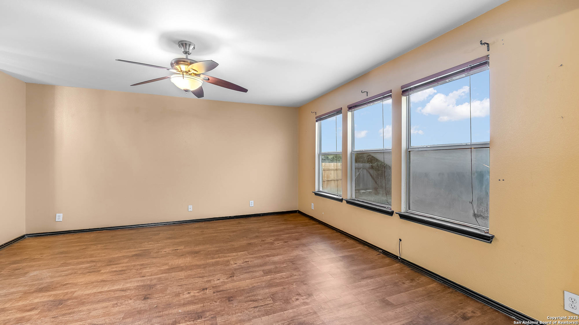 9406 San Fidel Rio San Antonio, TX 78245 - Photo 4 of 23 a view of an empty room with a window