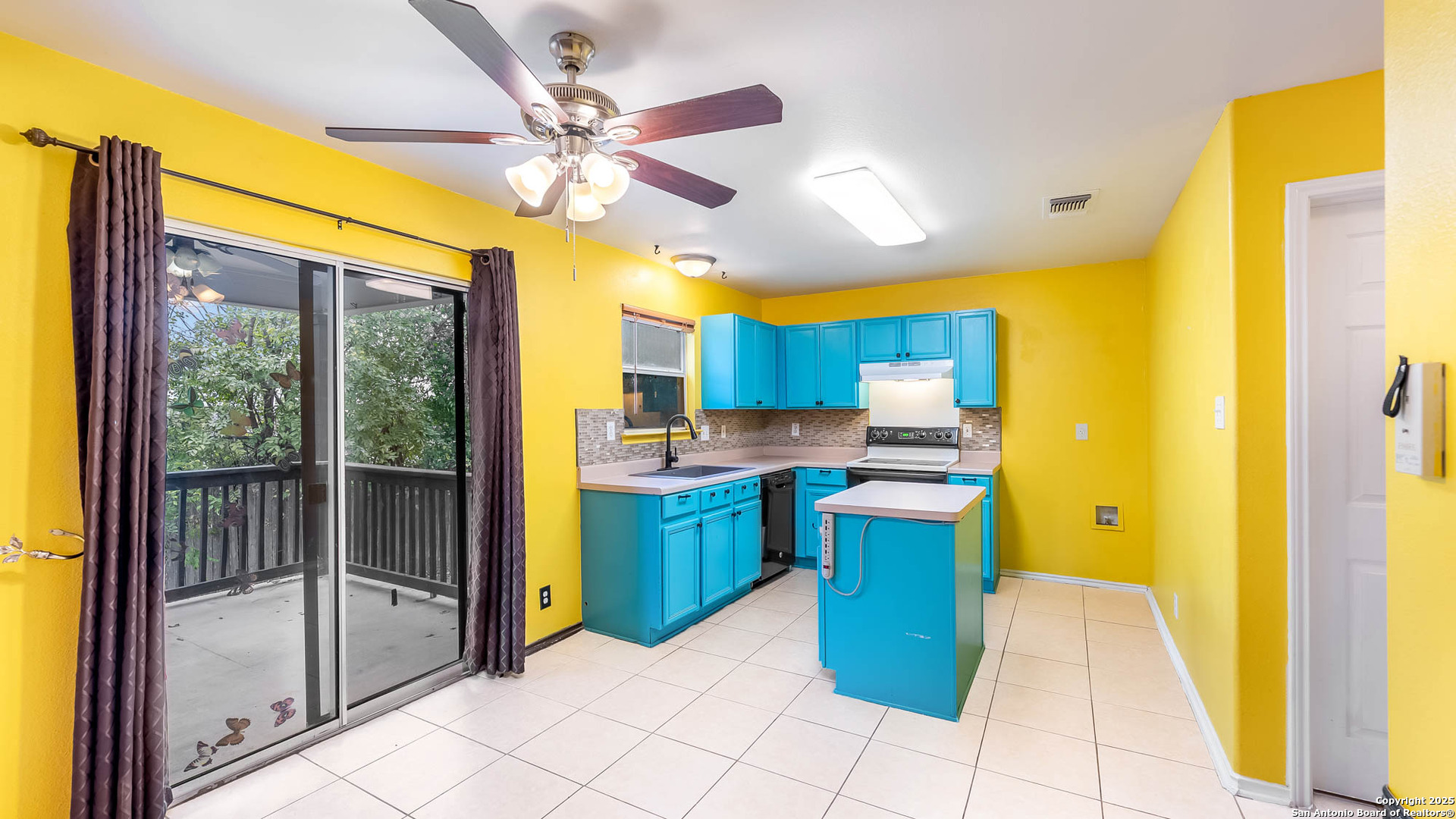 9406 San Fidel Rio San Antonio, TX 78245 - Photo 5 of 21 a kitchen with a sink appliances and cabinets