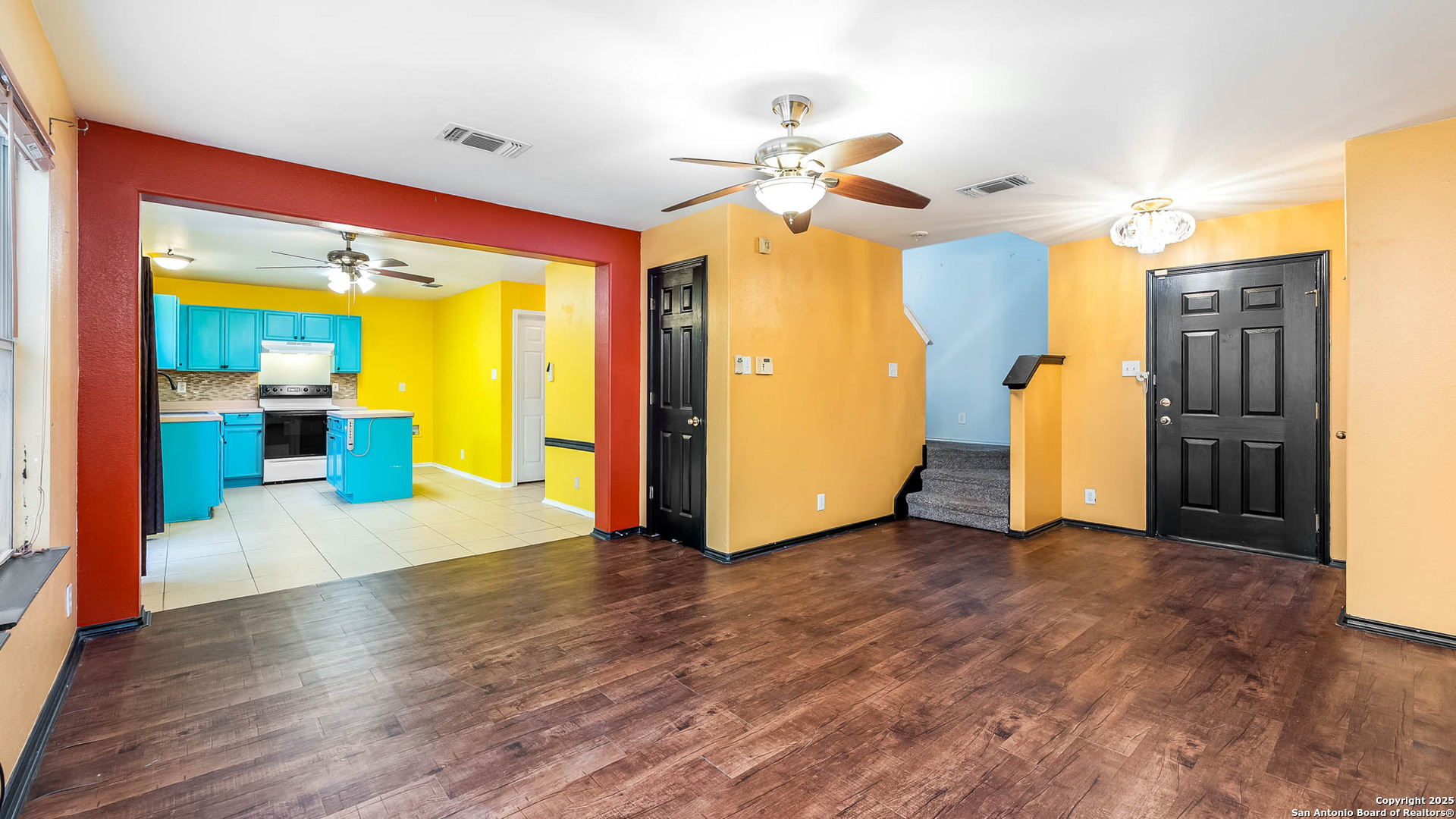 9406 San Fidel Rio San Antonio, TX 78245 - Photo 5 of 23 a view of a livingroom with a chandelier furniture and a ceiling fan