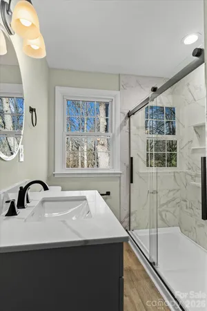 a bathroom with a sink and a bathtub
