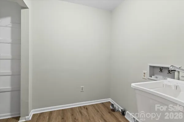 a bathroom with a sink and vanity
