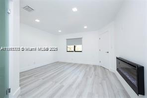 455 Northeast 210th Terrace Miami, FL 33179 - Photo 16 of 25 a view of an empty room and a window