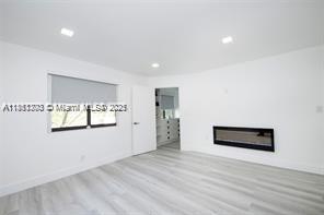 455 Northeast 210th Terrace Miami, FL 33179 - Photo 17 of 25 a view of an empty room with a window