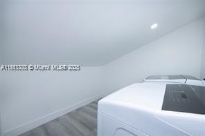 455 Northeast 210th Terrace Miami, FL 33179 - Photo 21 of 25 a utility room with dryer and washer