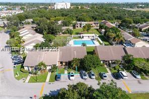 455 Northeast 210th Terrace Miami, FL 33179 - Photo 25 of 25 an aerial view of a house with garden space and street view