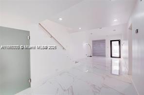 455 Northeast 210th Terrace Miami, FL 33179 - Photo 5 of 25 a view of a room with windows