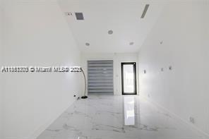 455 Northeast 210th Terrace Miami, FL 33179 - Photo 8 of 25 a view of a storage & utility room