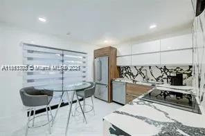 a view of a livingroom with furniture