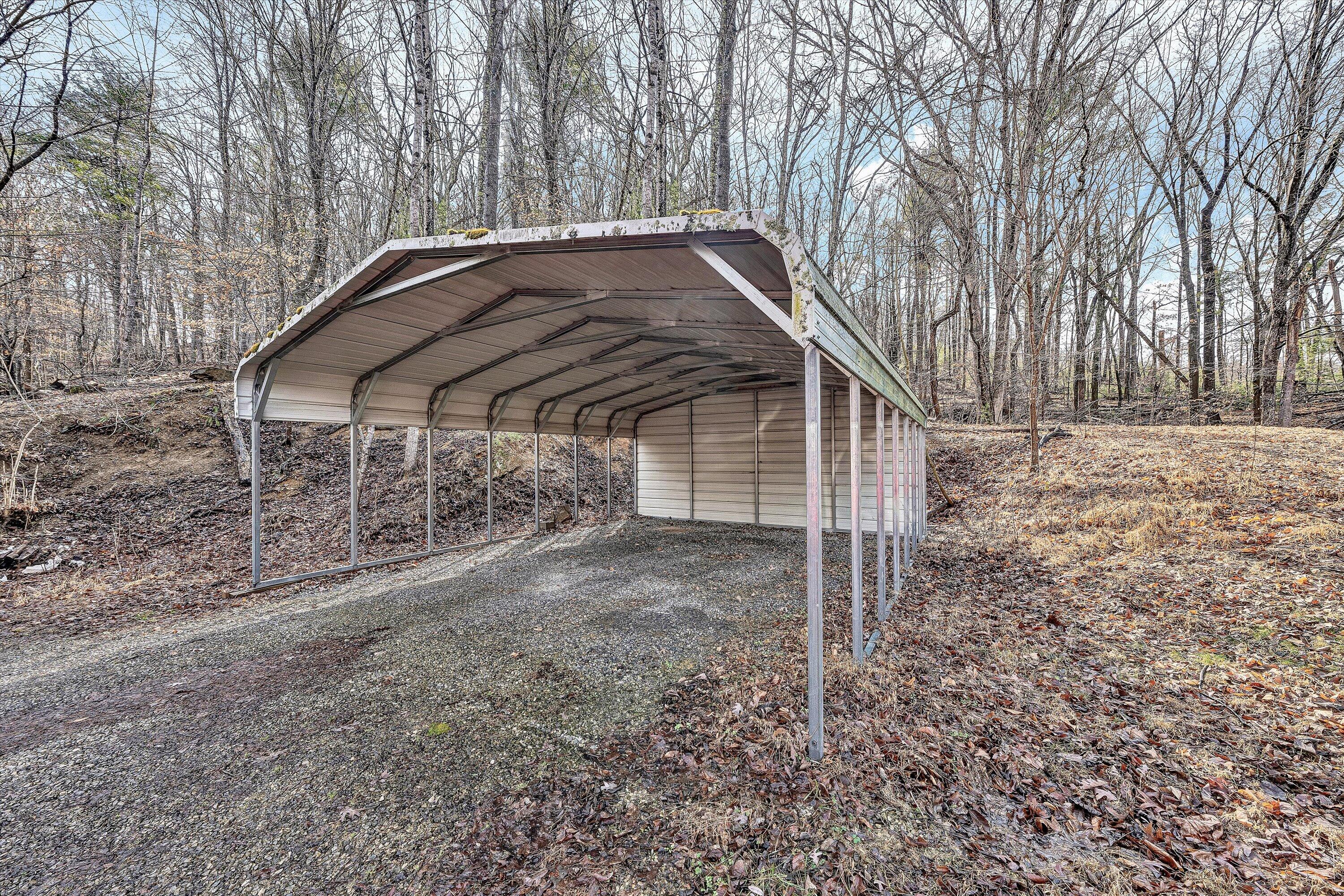 4312 Harborwood Road Salem, VA 24153 - Photo 23 of 32 a backyard of a house with lots of green space