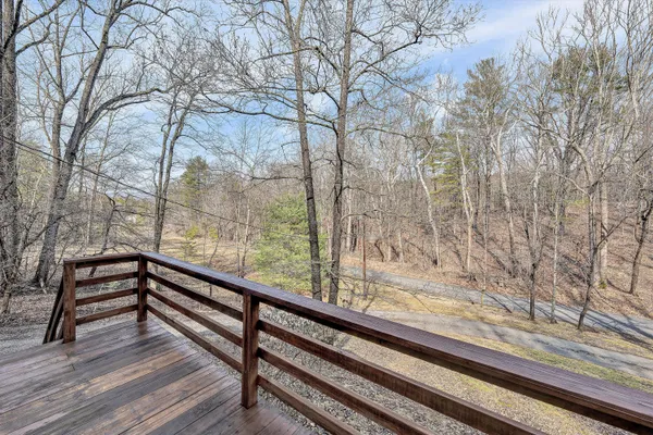 a view of a wooden roof deck