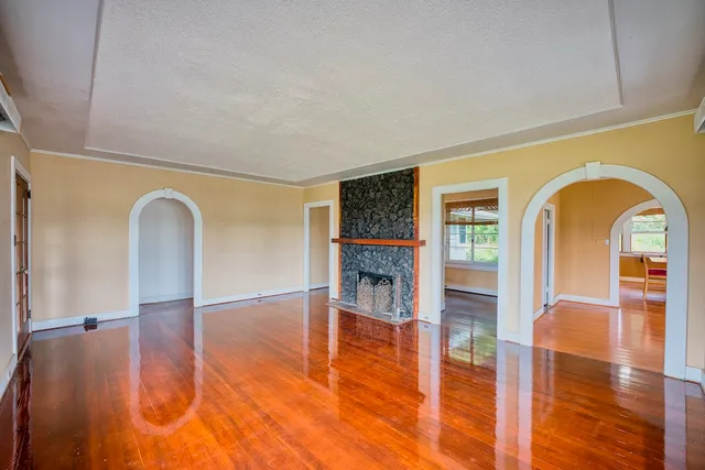 a view of livingroom with furniture wooden floor and window