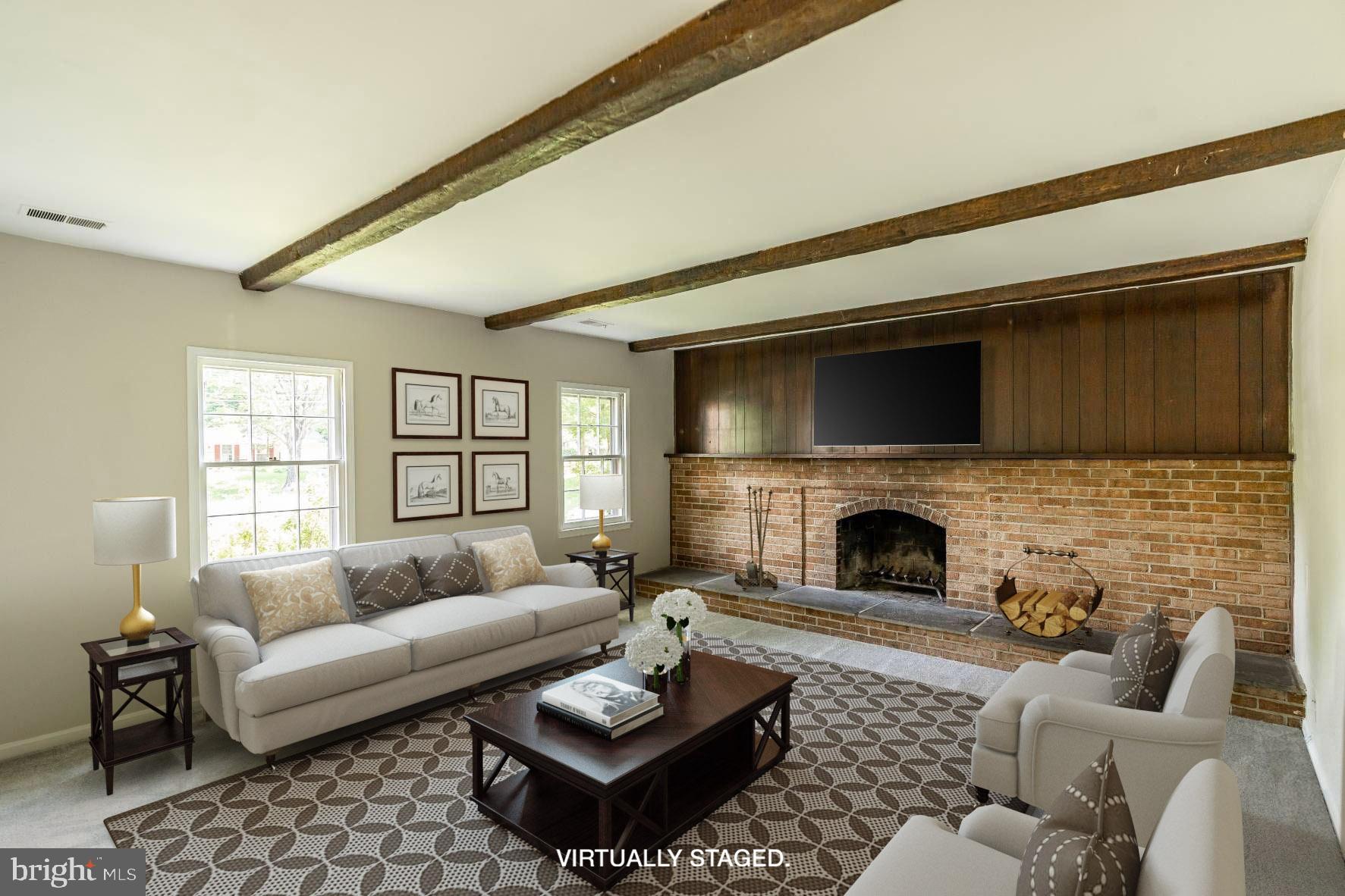 12209 St James Road Potomac, MD 20854 - Photo 14 of 20 Lower Level w/ Wood Burning Fireplace