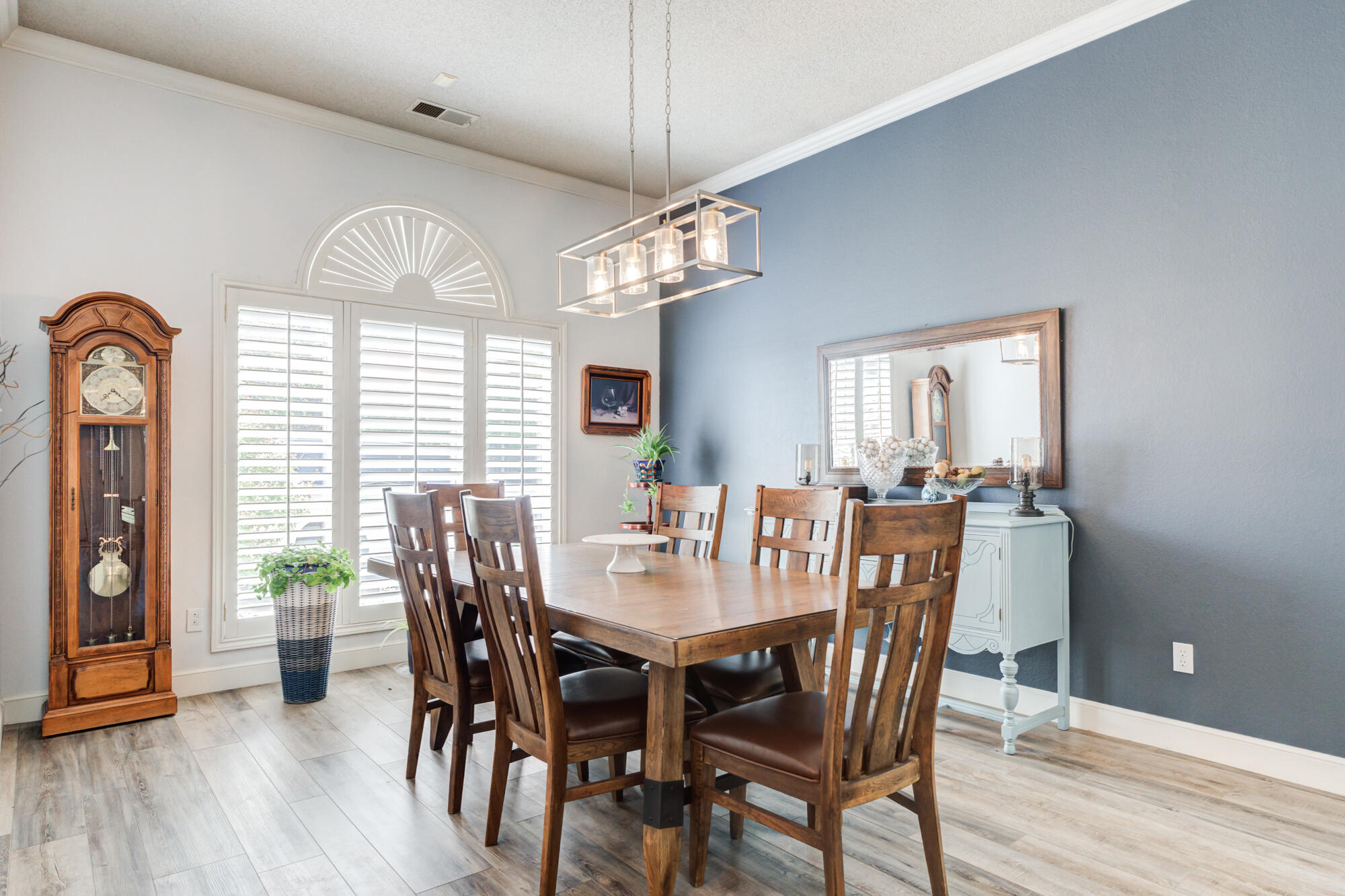 3522 156th Street Lubbock, TX 79423 - Photo 11 of 75 a view of a dining room with furniture window and wooden floor