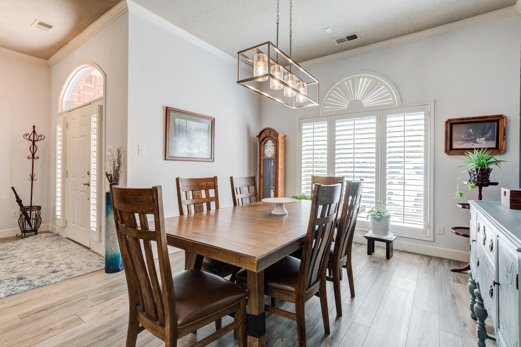 3522 156th Street Lubbock, TX 79423 - Photo 12 of 75 a view of a dining room with furniture window and wooden floor