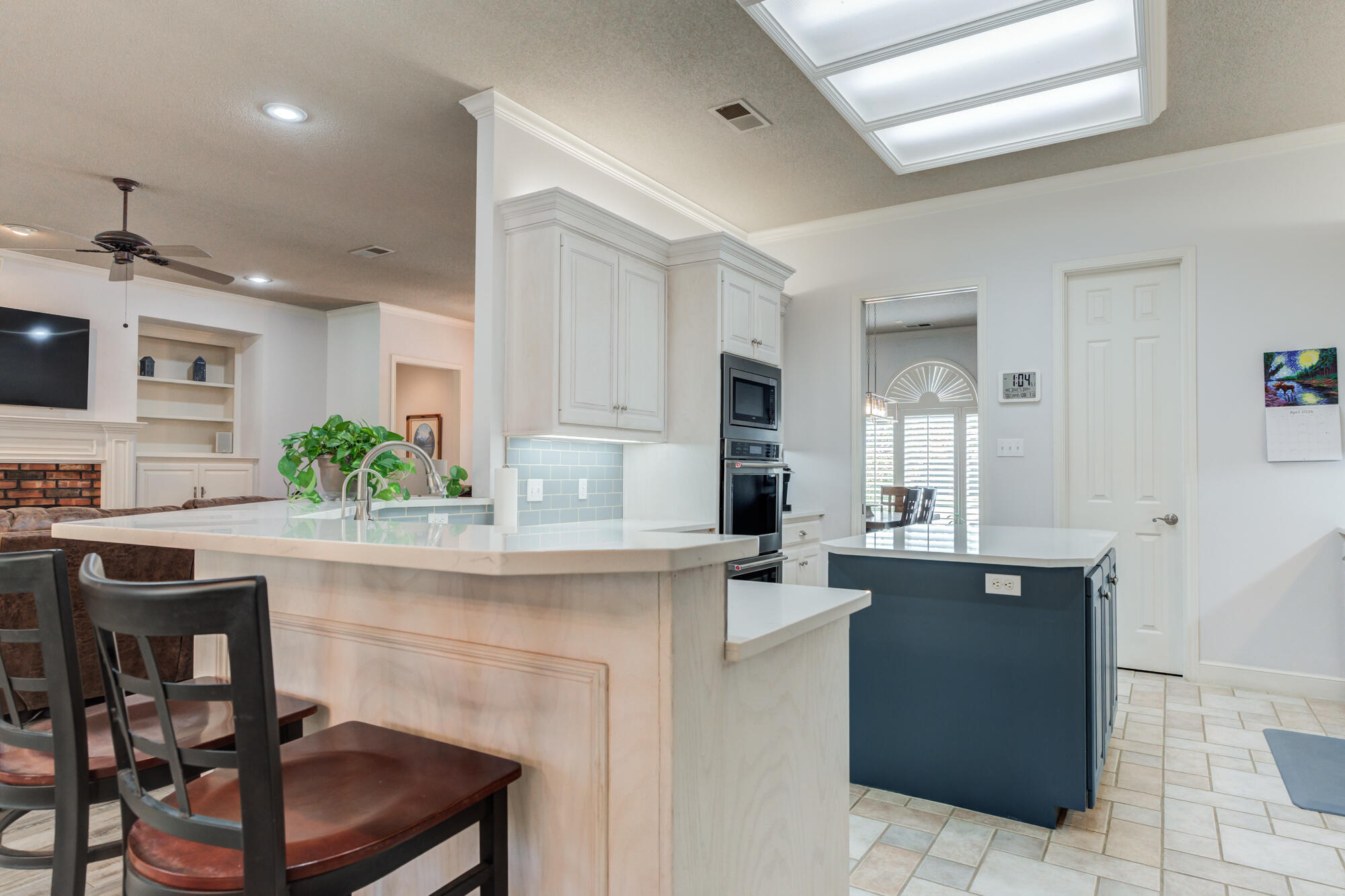 3522 156th Street Lubbock, TX 79423 - Photo 23 of 75 a kitchen with a table and chairs in it