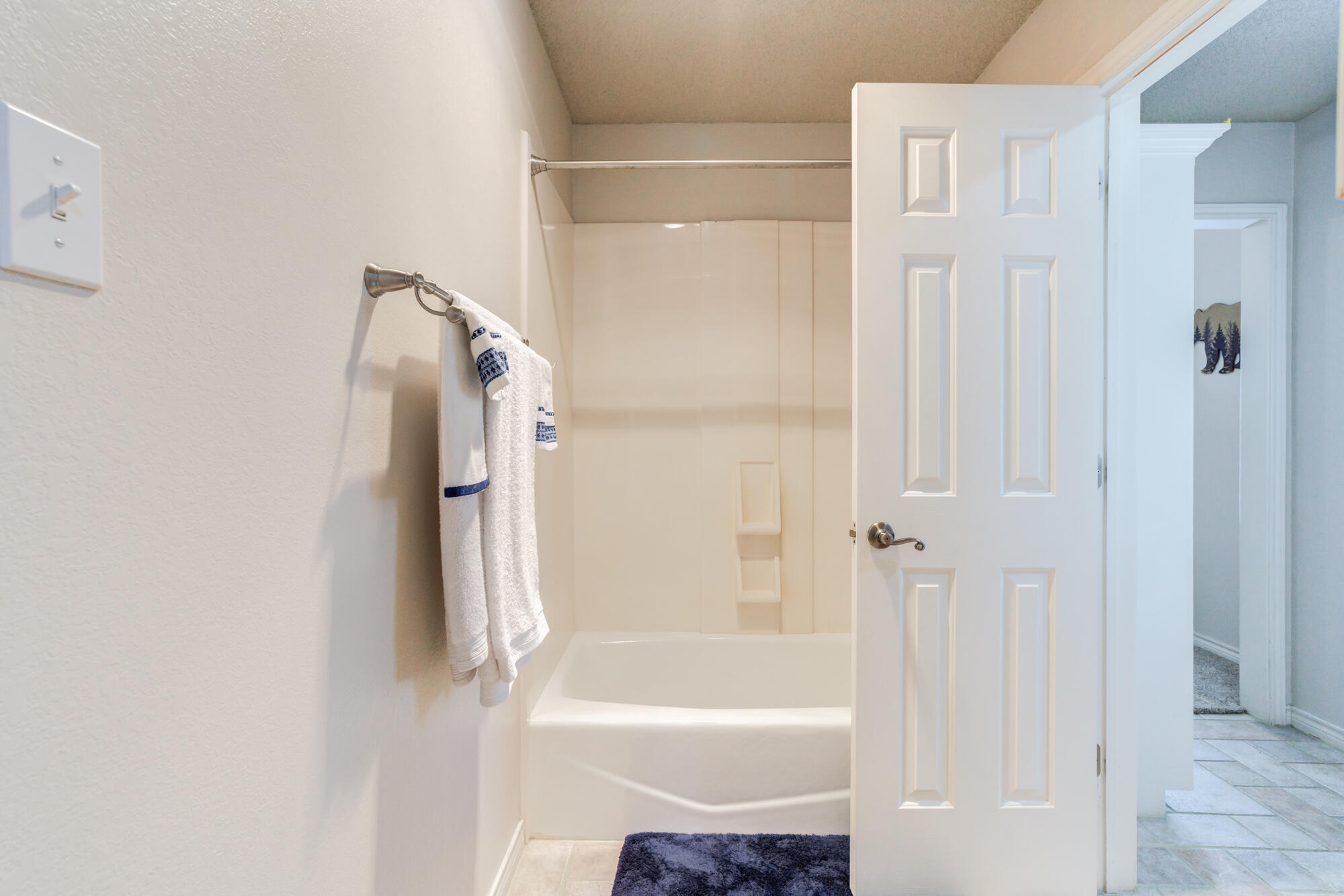3522 156th Street Lubbock, TX 79423 - Photo 52 of 75 a bathroom with a shower and a bath tub