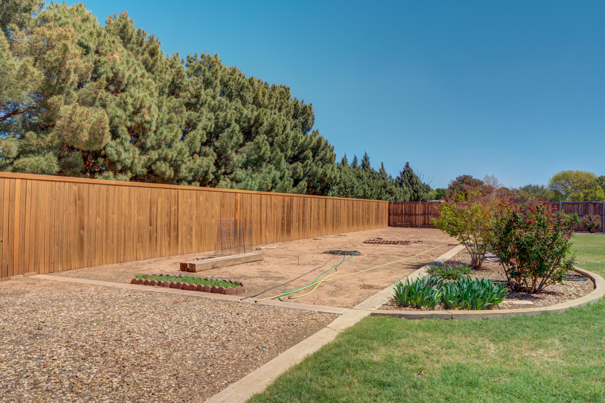 3522 156th Street Lubbock, TX 79423 - Photo 71 of 75 a backyard of a house with lots of green space