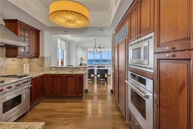 a large bathroom with a large tub and sink