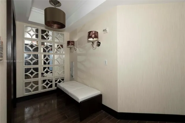 a front view of a building with glass windows