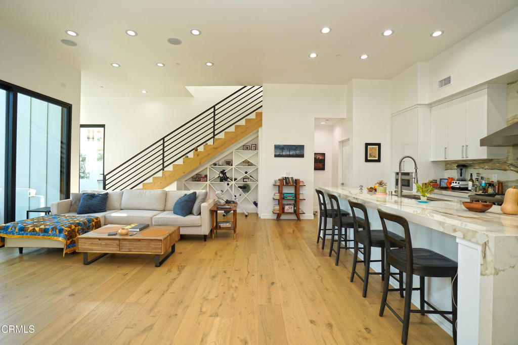 6565 Pickwick Street Los Angeles, CA 90042 - Photo 11 of 41 a living room with stainless steel appliances furniture cabinets and a kitchen view