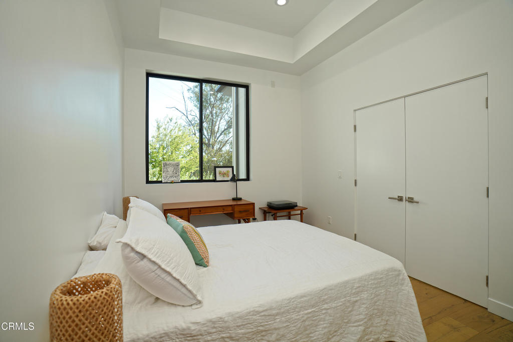 6565 Pickwick Street Los Angeles, CA 90042 - Photo 17 of 41 a bedroom with a bed and window