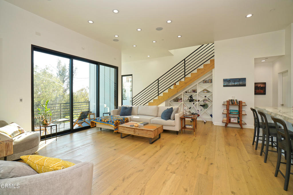 6565 Pickwick Street Los Angeles, CA 90042 - Photo 4 of 41 a living room with furniture and large windows