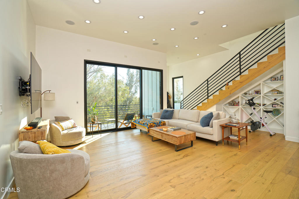 6565 Pickwick Street Los Angeles, CA 90042 - Photo 5 of 41 a living room with furniture and floor to ceiling window