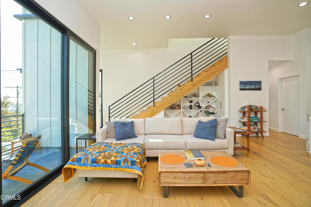 6565 Pickwick Street Los Angeles, CA 90042 - Photo 6 of 41 a living room with furniture and stairs