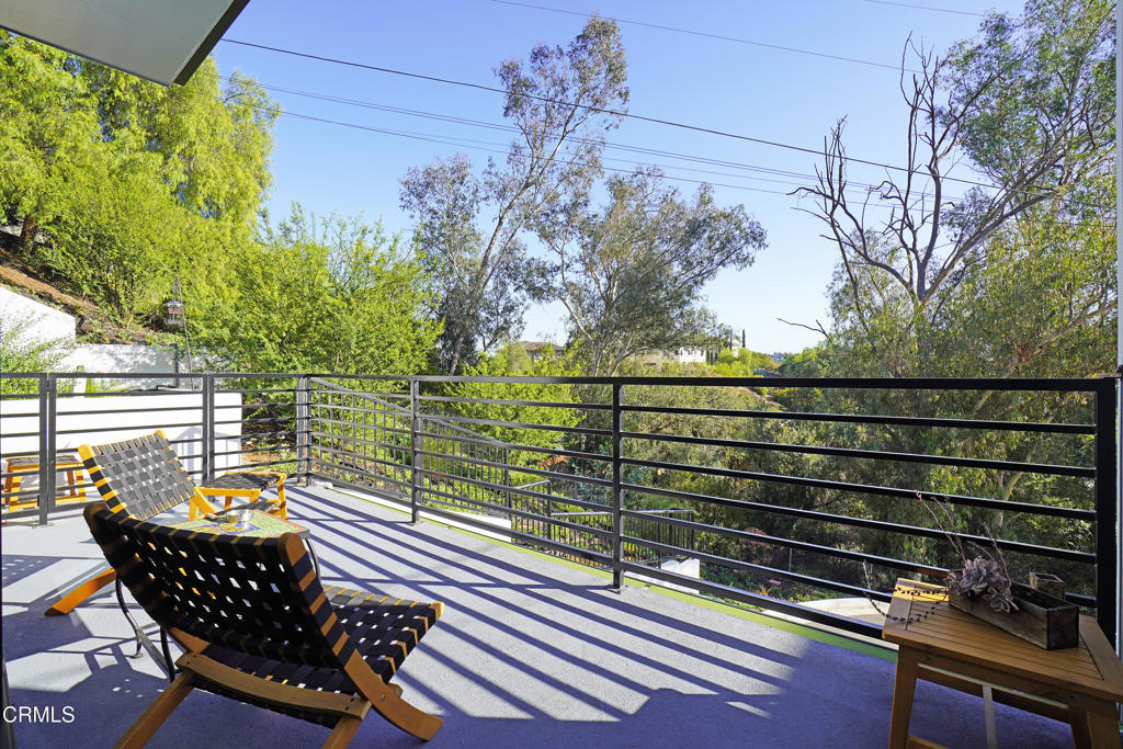 6565 Pickwick Street Los Angeles, CA 90042 - Photo 9 of 41 a view of a chairs and table on the wooden floor