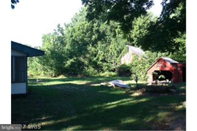 5219 Sands Road Lothian, MD 20711 - Photo 4 of 5 Exterior (Rear)