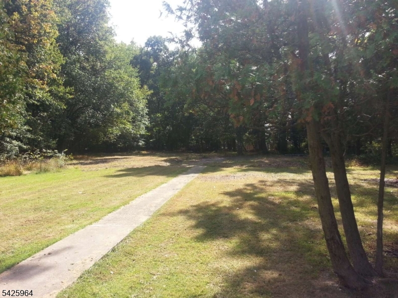 451 River Road East Hanover, NJ 07936 - Photo 1 of 3 a view of an outdoor space and swimming pool