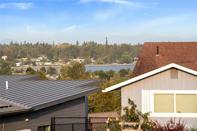 a view of lake with green space