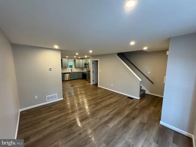 a view of a livingroom with a furniture