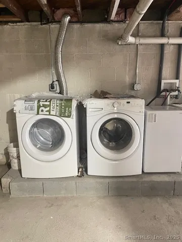 a utility room with dryer and washer