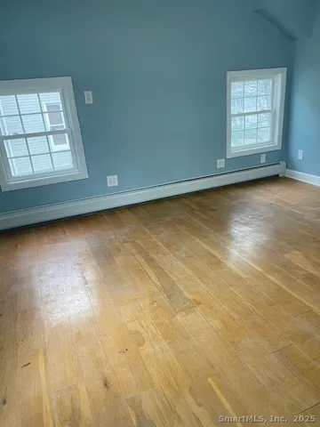 an empty room with windows
