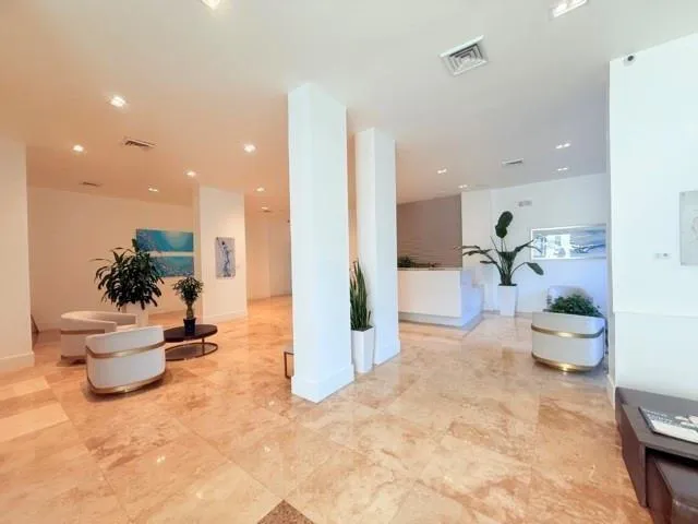 a view of swimming pool with outdoor seating