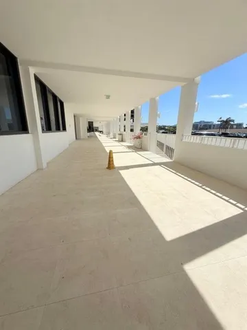 a view of a livingroom with furniture and window