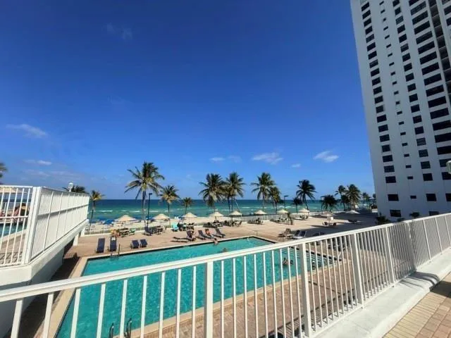 a building with glass door and outdoor space
