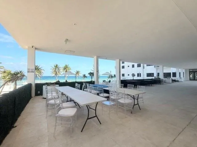 a front view of a building with a street