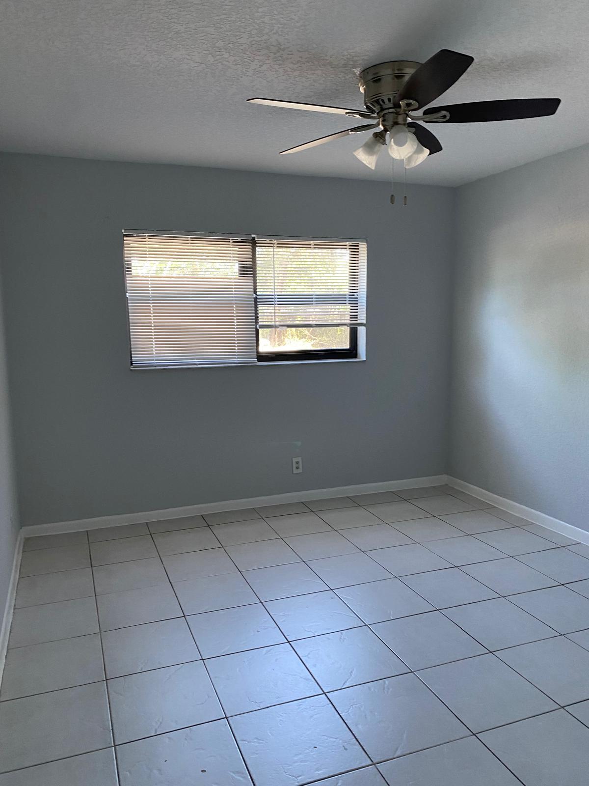 1195 Northwest 16th Avenue, Unit 10 Boca Raton, FL 33486 - Photo 9 of 13 a view of an empty room