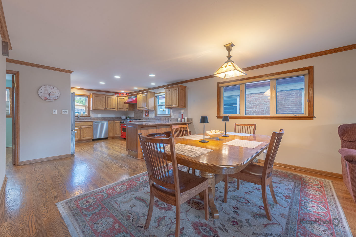 604 West 43rd Street Chicago, IL 60609 - Photo 5 of 30 a dining room with a wooden table and chairs