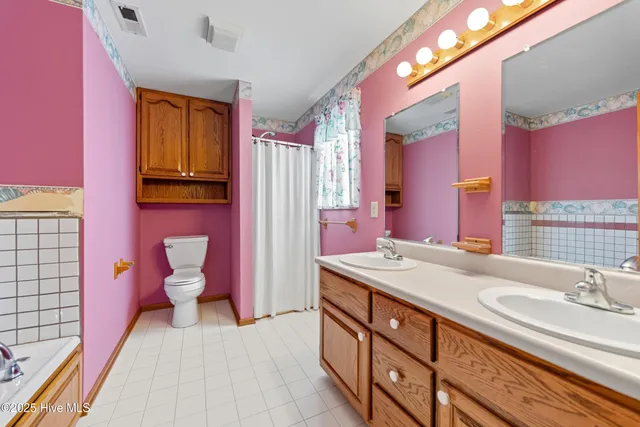 $445,000 | 102 Wade Avenue, Knotts Island, NC 27950