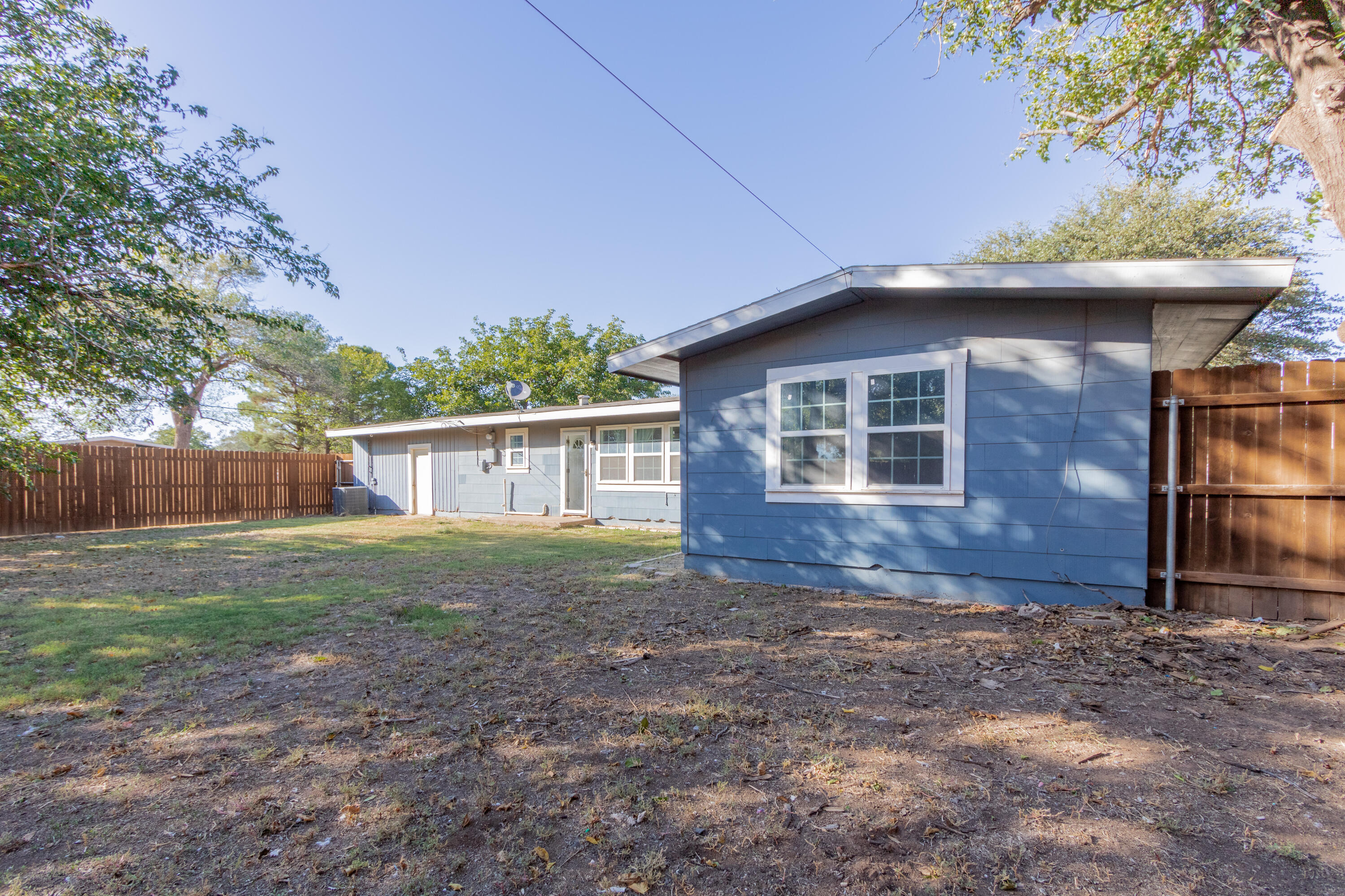 4021 38th Street Lubbock, TX 79413 - Photo 31 of 32 a view of a house with yard and a garden