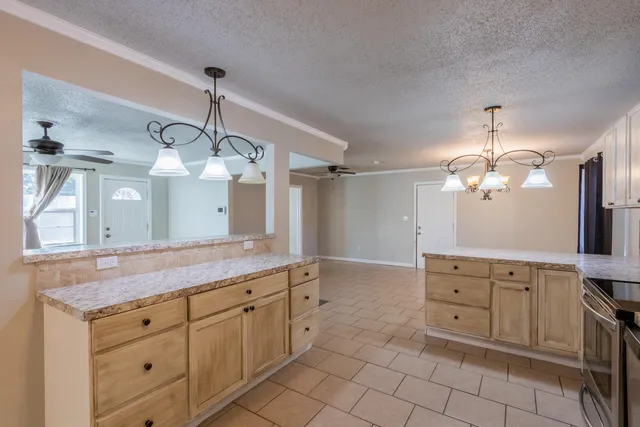 a bathroom with a granite countertop sink a mirror and a